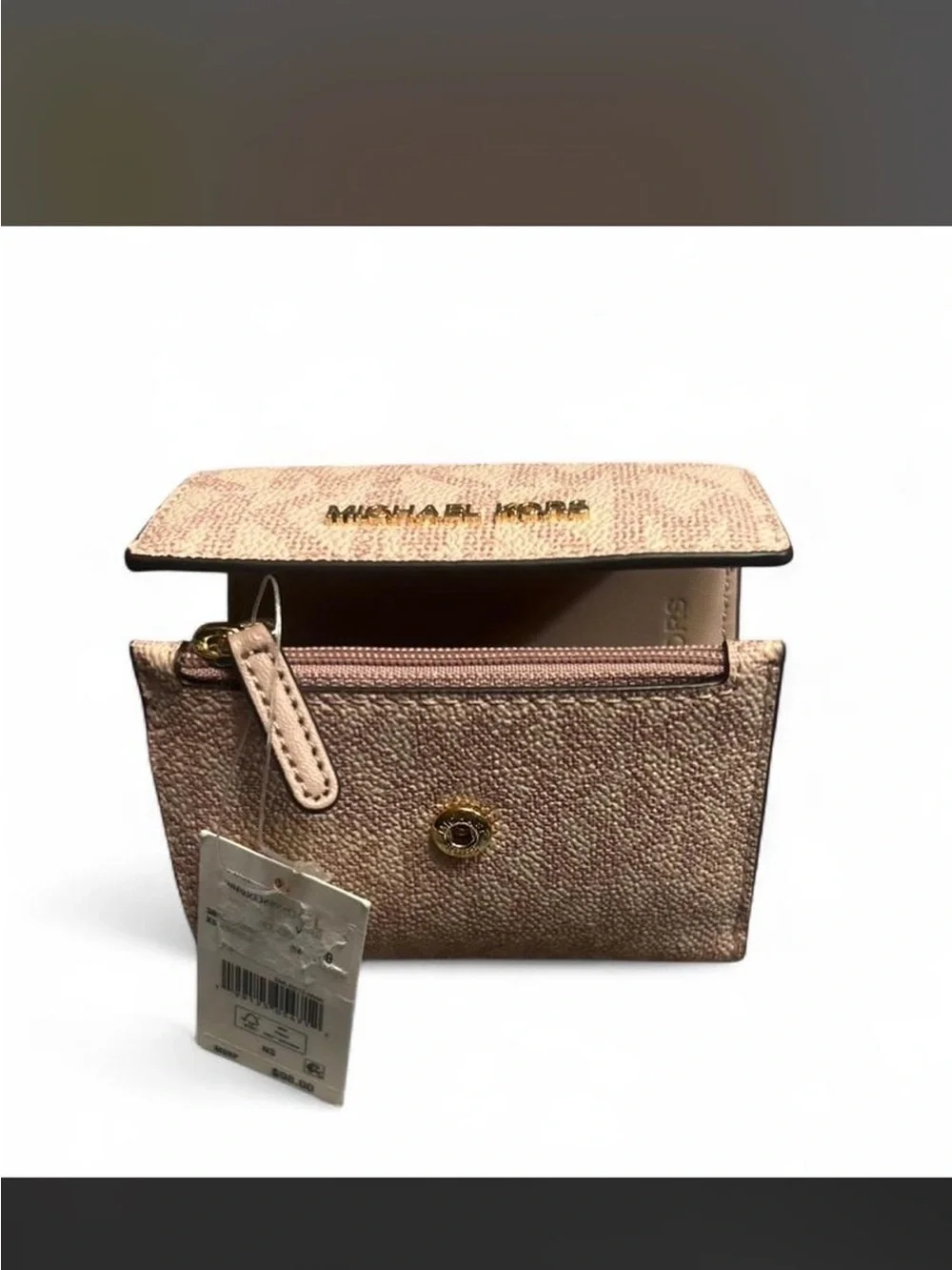 NWT Michael Kors XS trifold wallet.